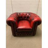 An oxblood club Chesterfield chair