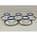 A Minton set of five tea cups and six saucers.
