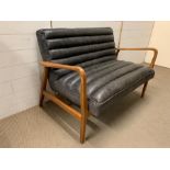 A Mid Century style Scott two-seater sofa in graphite leather and ash/birch frame, Scandinavian