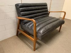 A Mid Century style Scott two-seater sofa in graphite leather and ash/birch frame, Scandinavian