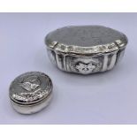 Two silver lidded pots