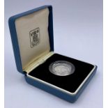 A Royal Mint United Kingdom Silver Proof One Pound Coin