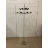 A wrought iron adjustable chandelier on stand or detached for hanging from hook.