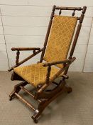 A turned Victorian mahogany rocking chair