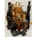 A Large selection of carved wooden items, to include, African, Oriental and Asian.