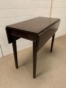 A mahogany drop-side side table (H72cm W84cm D44cm)