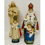 A selection of four religious themed statues