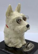 A Vintage West Highland Terrier on battery base with light up eyes.