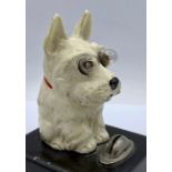 A Vintage West Highland Terrier on battery base with light up eyes.