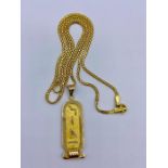 An Arabic gold chain and pendant marked 750 (Total Weight 12.7g)