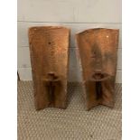 Two outside terracotta candle wall hangings