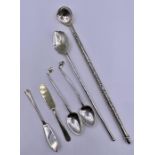 A selection of hallmarked silver cutlery to include spoons, butter knives, hot chocolate spoons.