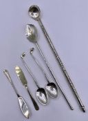 A selection of hallmarked silver cutlery to include spoons, butter knives, hot chocolate spoons.