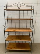 A large wrought iron bakers rack (H184cm W100cm D44cm)