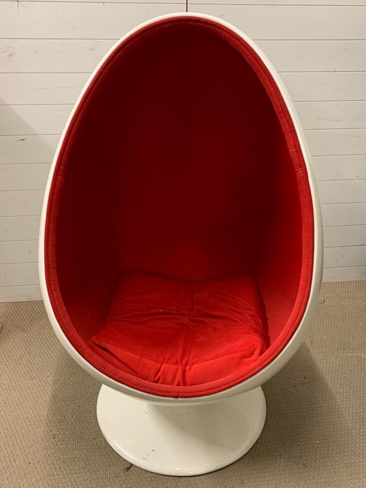 A Henrik Thor Larsen 1960 Ovalia Style egg chair with red upholstery