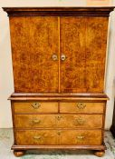 A Queen Anne style walnut fitted cabinet on chest. Escritoire with a pair of doors, opening to