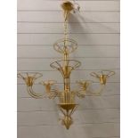 A pair of contemporary metal work gilt chandeliers (H170cm D65cm)