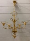 A pair of contemporary metal work gilt chandeliers (H170cm D65cm)