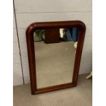 A mahogany wall mirror (82cm X 54cm)