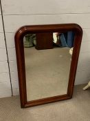 A mahogany wall mirror (82cm X 54cm)