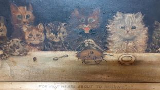 "For what we are about to receive", a painting following Louis William Wain, framed, (30x56 cm).