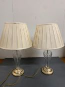 A pair of contemporary cut glass table lamps