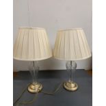 A pair of contemporary cut glass table lamps