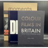 A collection of four large reference books on film and photography
