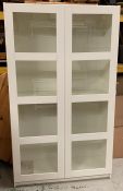 A glazed fronted bookcase (H200cm W118cm)