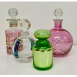 A selection of four perfume bottles