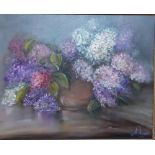 'Vase with hydrangeas', an oil on canvas signed 'Mcartney' within an elaborate frame, (39x50 cm).