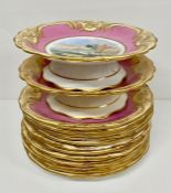 Twelve hand painted tea plates and two cake stands in pink and gilt porcelain