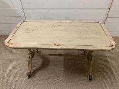 A painted side table on lion paw casters (H50cm W87cm D44cm)