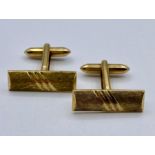 A pair of 9ct gold Gents cuff links (13.3g Total Weight)