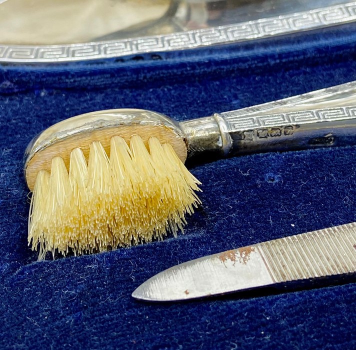 A cased ladies vanity set, silver handled with Greek key design by Henry Matthews and hallmarked for - Image 2 of 5