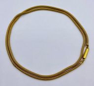 An 18ct gold necklace (marked 18ct) total weight 9.5g