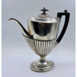 A Hallmarked silver coffee pot, maker Goldsmiths and Silversmiths London 1901, total weight 576g