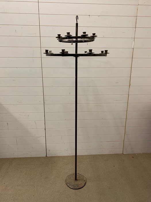 A wrought iron adjustable chandelier on stand or detached for hanging from hook.