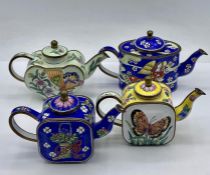 Four small Chinese enamelled tea pots with butterfly and flower decoration