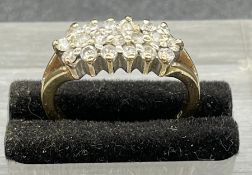 A 9ct gold and diamond ring (3.2g)
