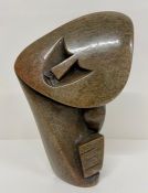 An African stone sculpture (H18cm x W12cm)