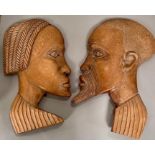 A Pair of Carved African wall plaques (60cm tall)