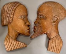 A Pair of Carved African wall plaques (60cm tall)