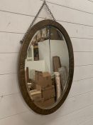 Arts and Crafts oval brass frame wall mirror