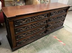 A carved sideboard (L190cm x D55cm x H81cm)