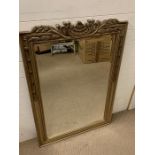 A contemporary wall mirror with carved wheat detail to top (77cm x 118cm)
