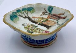 A small Chinese pin dish, signed