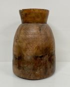 A turned wooden pot