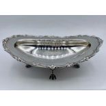 A silver bowl on four claw feet by James Dixon & Sons Ltd, hallmarked for Sheffield 1903, marked