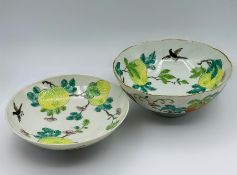 A porcelain bowl and saucer, with butterflies and fruit trees (H8cm Dia14cm Bowl) (H5cm Dia 13cm)